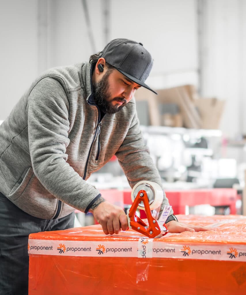 Person taping packages